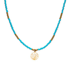 Ketting met turquoise kralen en levensboom bedel