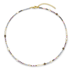 Ketting met paarse kralen en parels