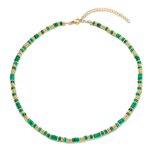 Ketting met rode steen en goudkleurige kralen