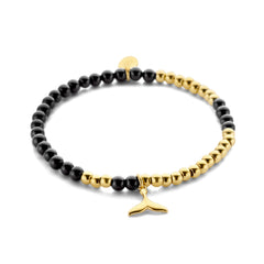 Beaded bracelet with black agate beads and whale charm