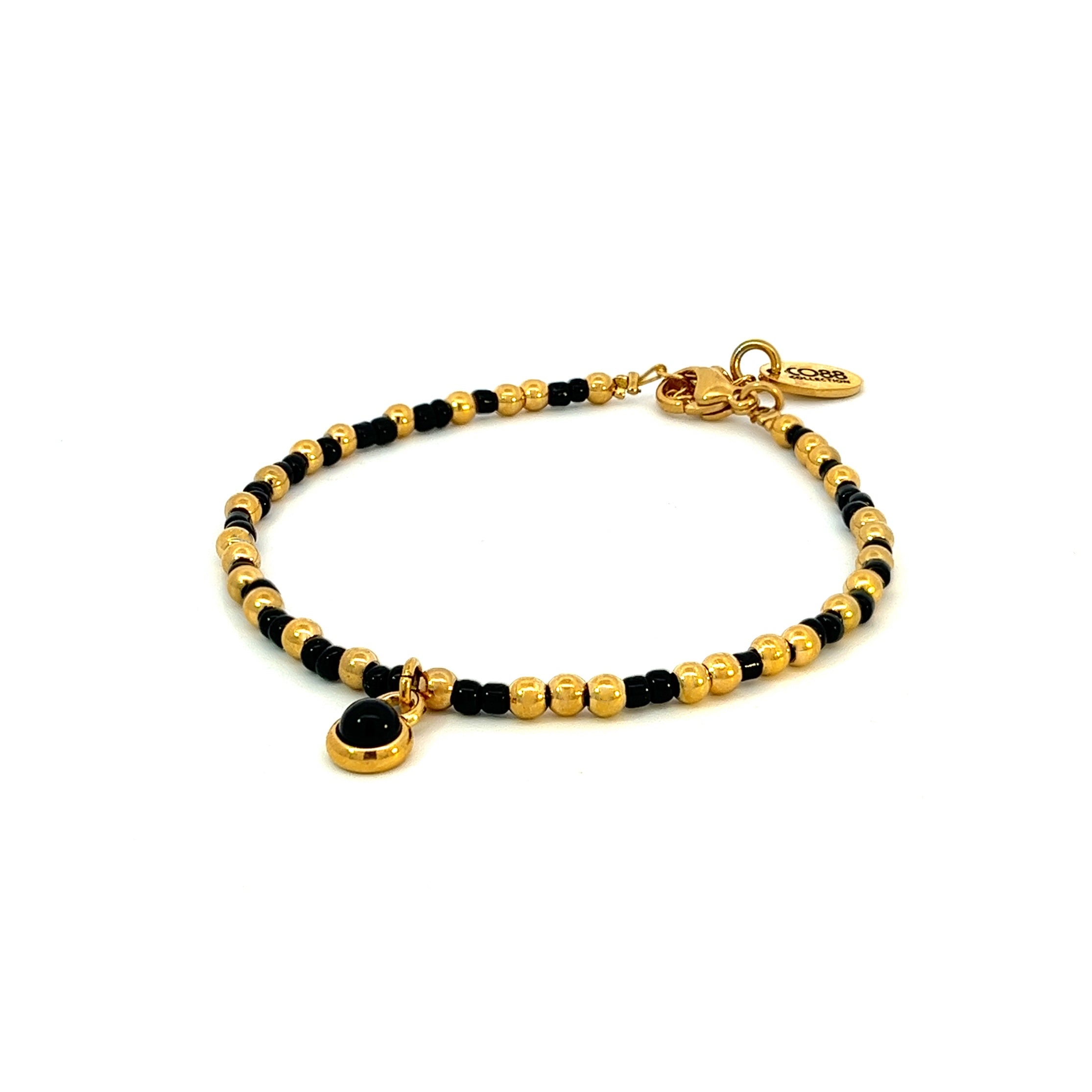 Beaded bracelet with black beads and black stone