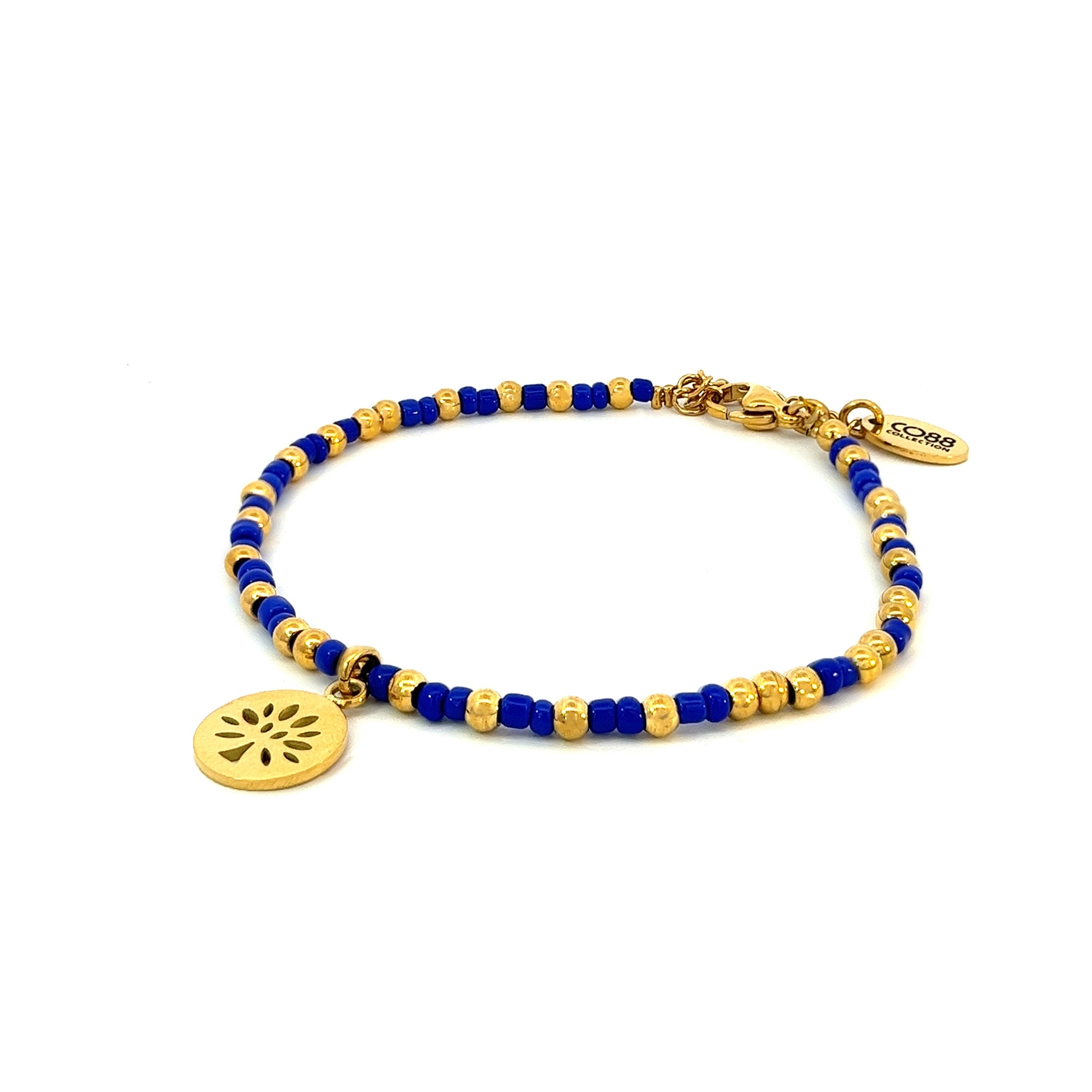 Beaded bracelet with purple beads and tree charm