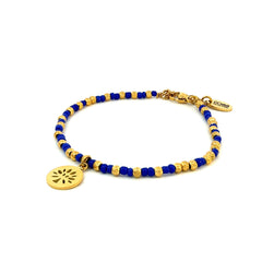 Kralenarmband met paarse kralen en boombedel