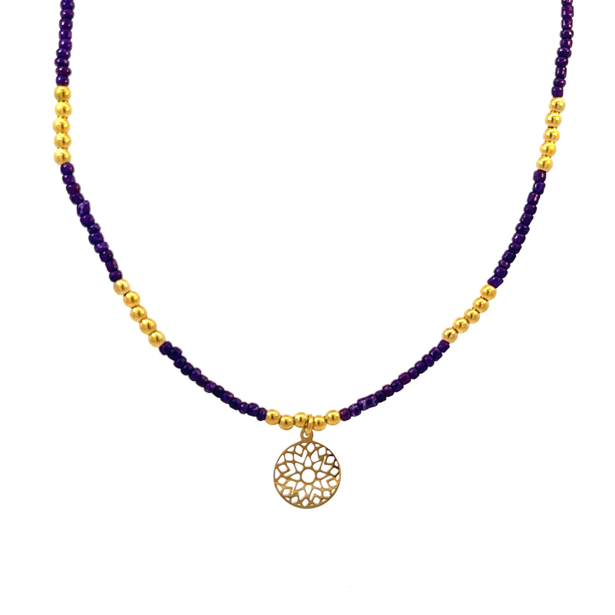 Necklace with purple beads and charm