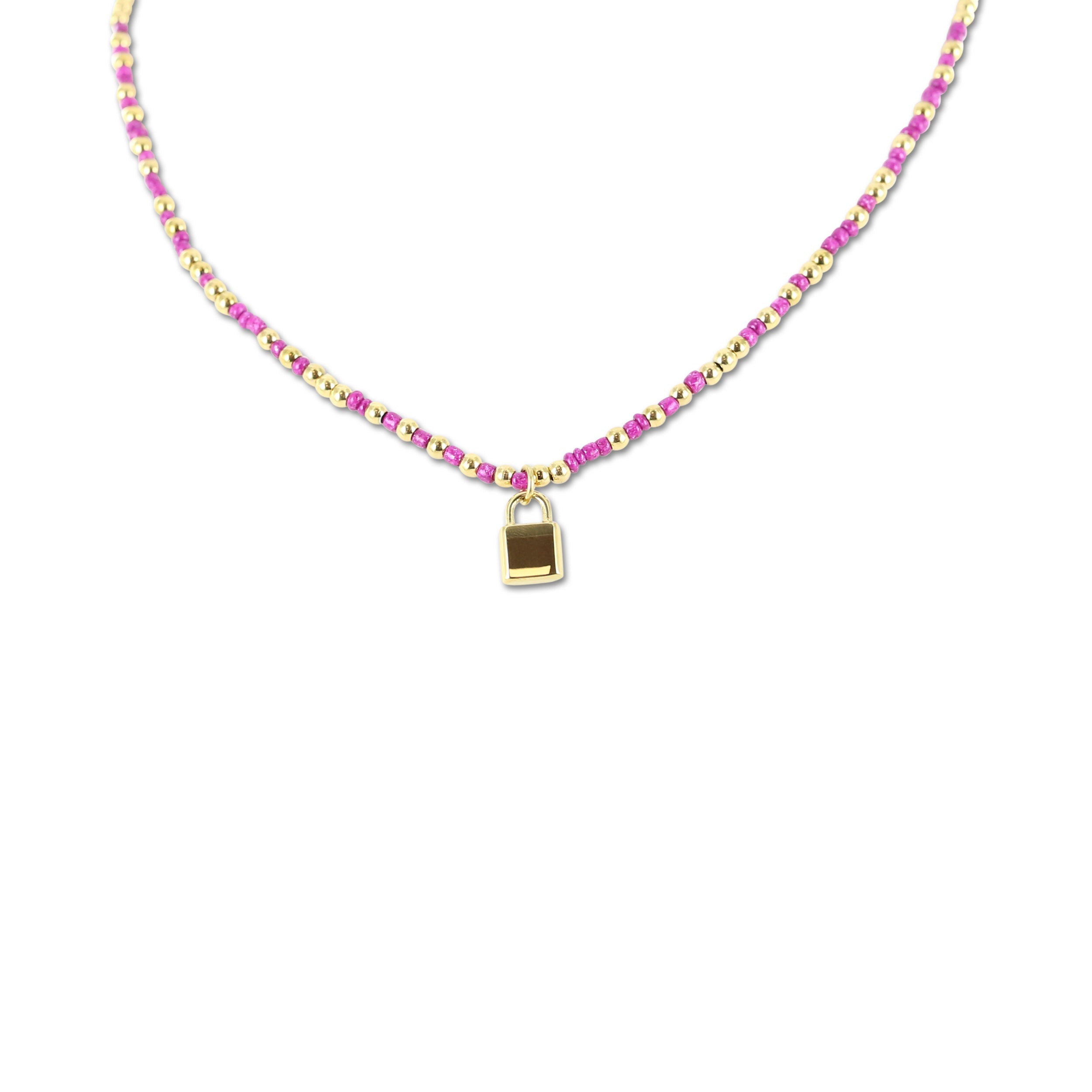 Necklace with pink beads and lock charm